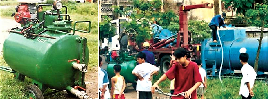 Mini vacuum tug (350 L) for narrow lanes, used together with a intermediate storage tank placed in the nearest accessible road. Source: STRAUSS et al. (2002)